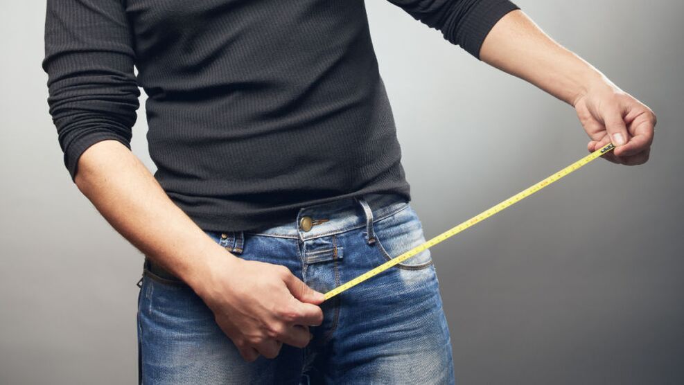 A man with a ruler counts a member